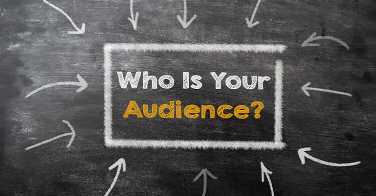 18 Ways to Write Better Blog Posts That Readers Will Finish 3 Chalkboard-style image with the text "Who Is Your Audience?" centered in a white rectangle, with the word "Audience?" in bold yellow. Multiple white chalk arrows point inward toward the text, visually reinforcing the concept of understanding your readers to create better blog posts.