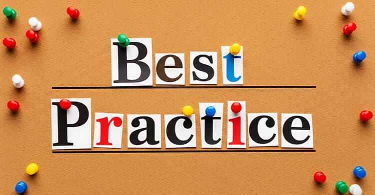 The words “Best Practice” are spelled out in a playful ransom-note style using cut-out letters pinned to a corkboard with colorful pushpins. The image suggests guidance or standards, often used in contexts like SEO copywriting best practices for effective content creation.