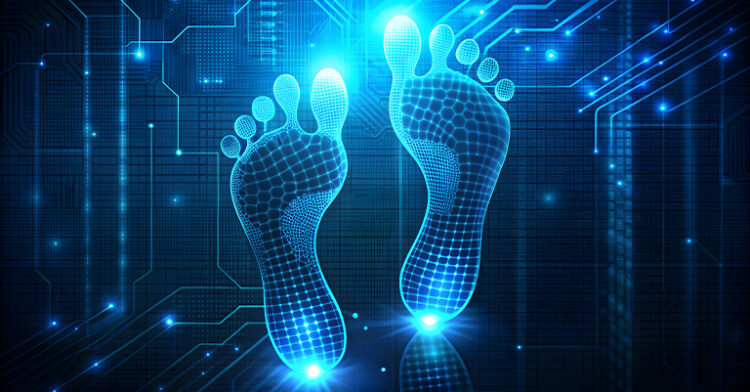 Digital footprints glowing on a dark, technology-themed background, representing the concept of digital footprints in the online world.