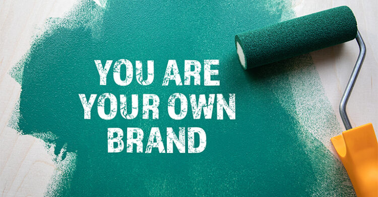 Paint roller creating a green background with the text "You Are Your Own Brand" displayed.
