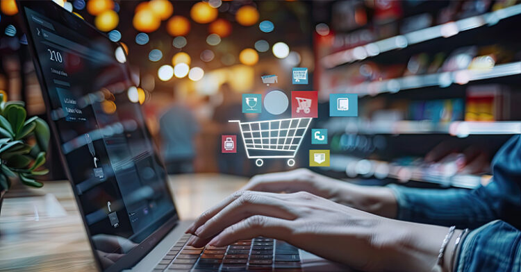 Social Commerce 101: How to Sell on Social Media 5 Hands typing on a laptop with a virtual shopping cart and icons, symbolizing online shopping and e-commerce.