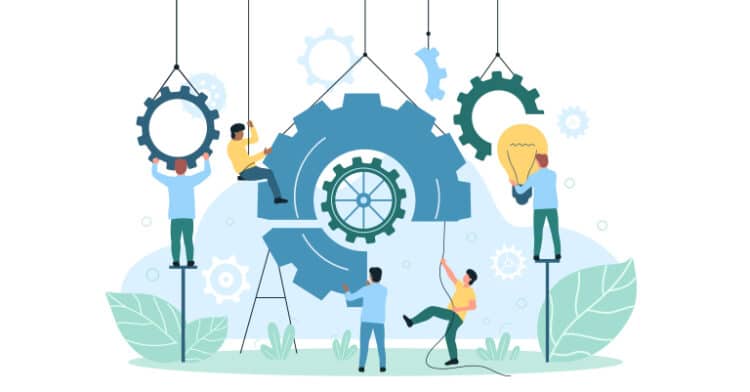Team of people assembling large gears and a light bulb outdoors, representing collaboration, innovation, and teamwork in building solutions.