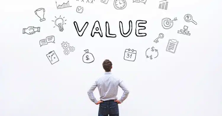 How to Use Social Media Influencers to Improve Your Marketing 4 Man standing with hands on hips looking at the word “VALUE” surrounded by hand-drawn icons on a white background.