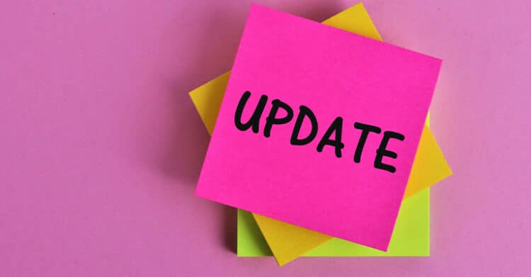 A stack of colorful sticky notes sits on a pink background, with the top note reading UPDATE in bold black letters. The image suggests a reminder, announcement, or content change that draws attention to something new or revised.