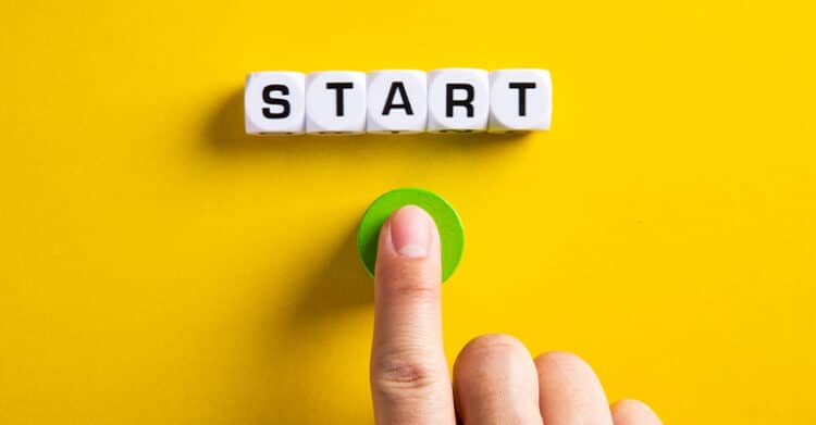 How to Write Blog Titles that Earn Clicks (A Complete Guide) 10 Finger pressing a green button beneath letter blocks spelling "START" on a bright yellow background. This visual works for a post about Blog Titles by suggesting a strong opening point and the first step in creating a headline that gets attention.