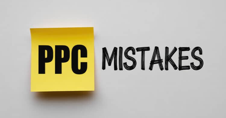 Yellow sticky note on a light gray background with the text "PPC" in bold black letters, next to the handwritten word "MISTAKES." Simple graphic representing common pay per click mistakes or errors in PPC campaign management.